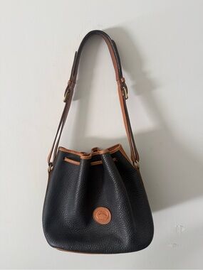 Dooney & Bourke Black Pebble Leather Drawstring Shoulder Bag with Tan Trim